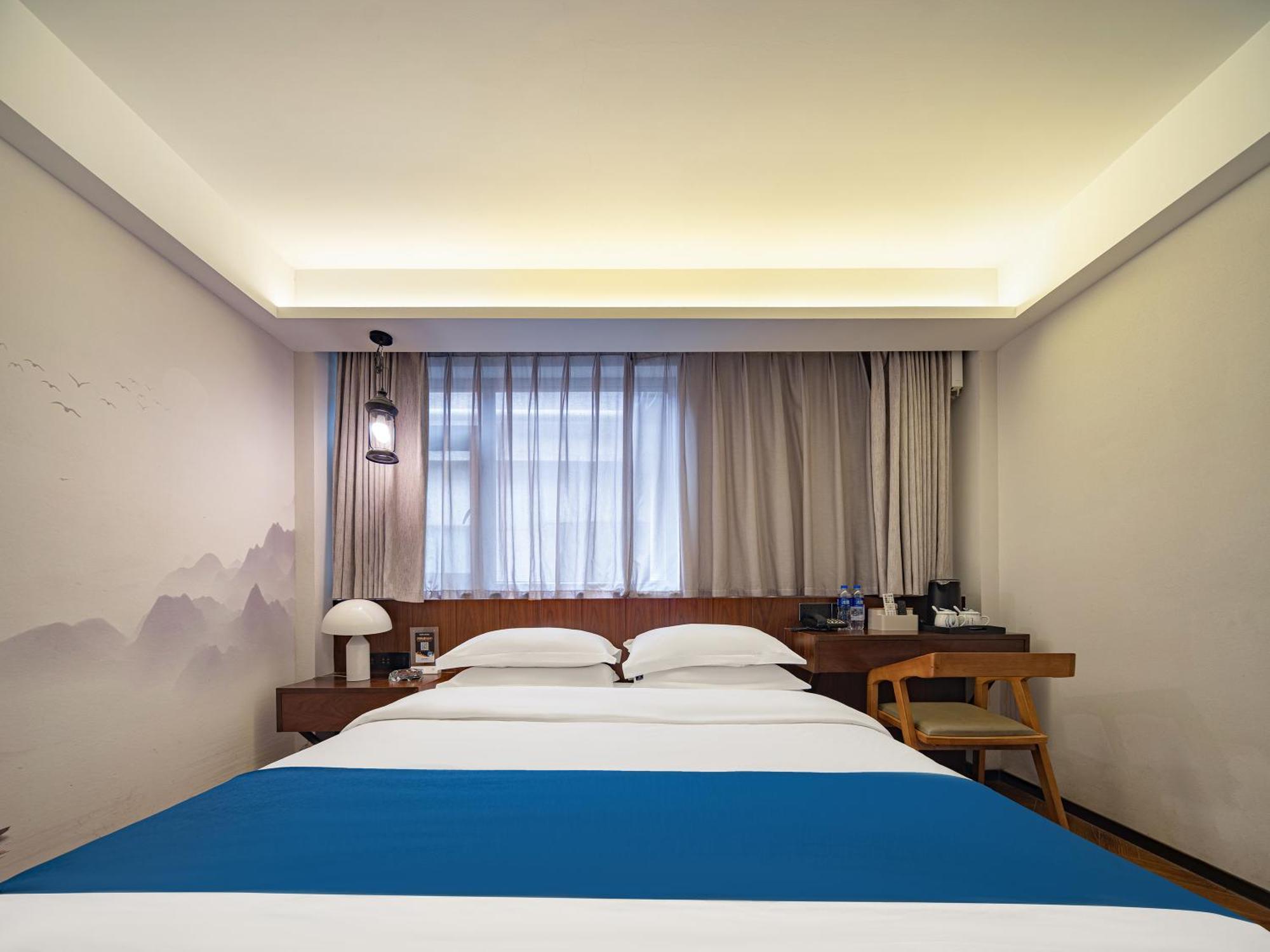 Hotel 張家界武陵源北岸輕奢客棧 森林公園店 Zhangjiajie Esterno foto