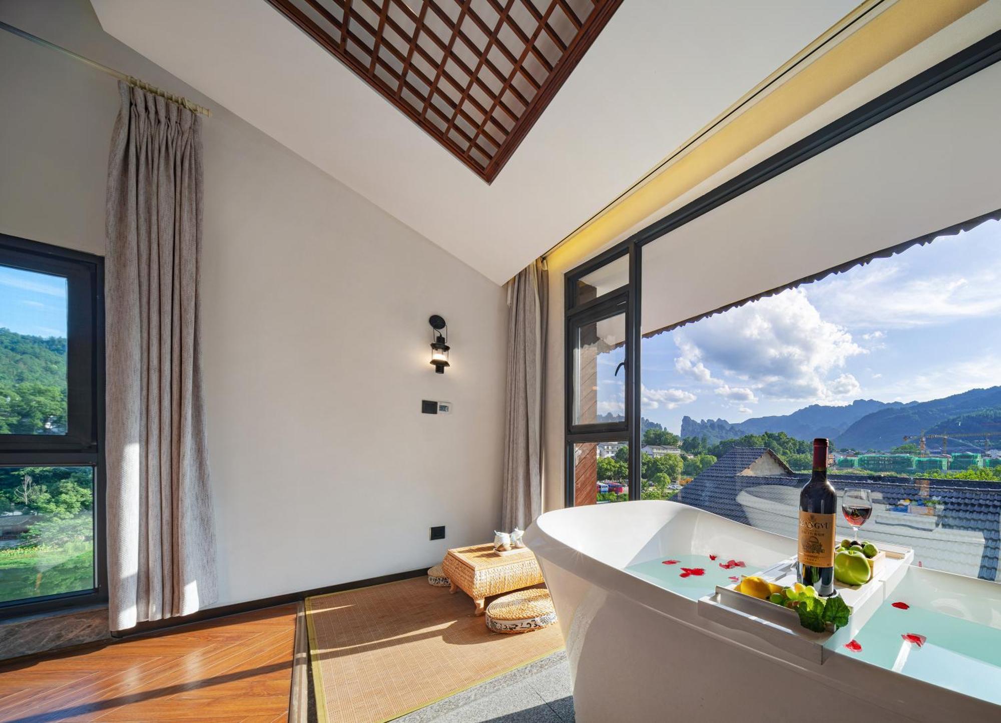 Hotel 張家界武陵源北岸輕奢客棧 森林公園店 Zhangjiajie Esterno foto