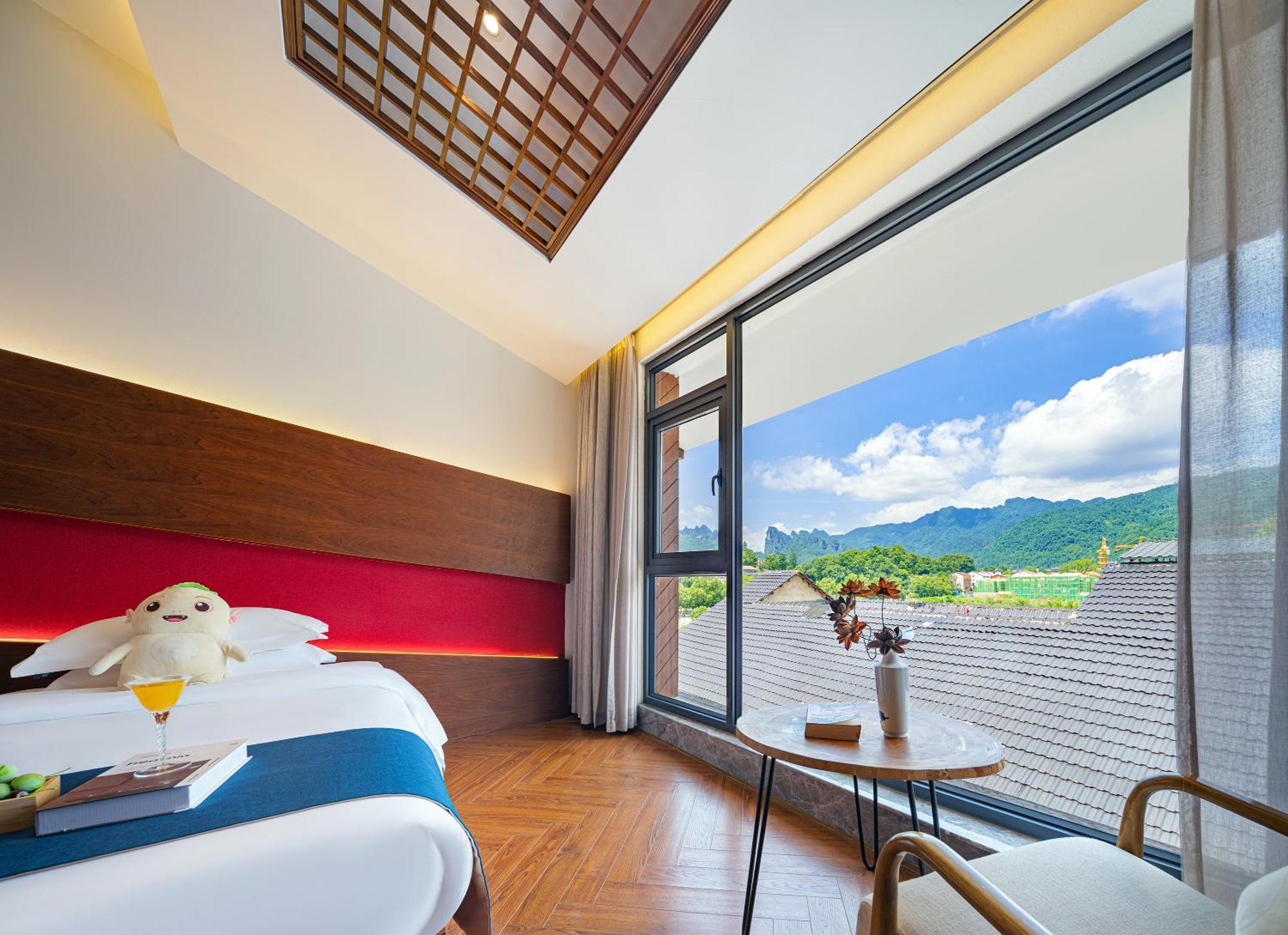 Hotel 張家界武陵源北岸輕奢客棧 森林公園店 Zhangjiajie Esterno foto