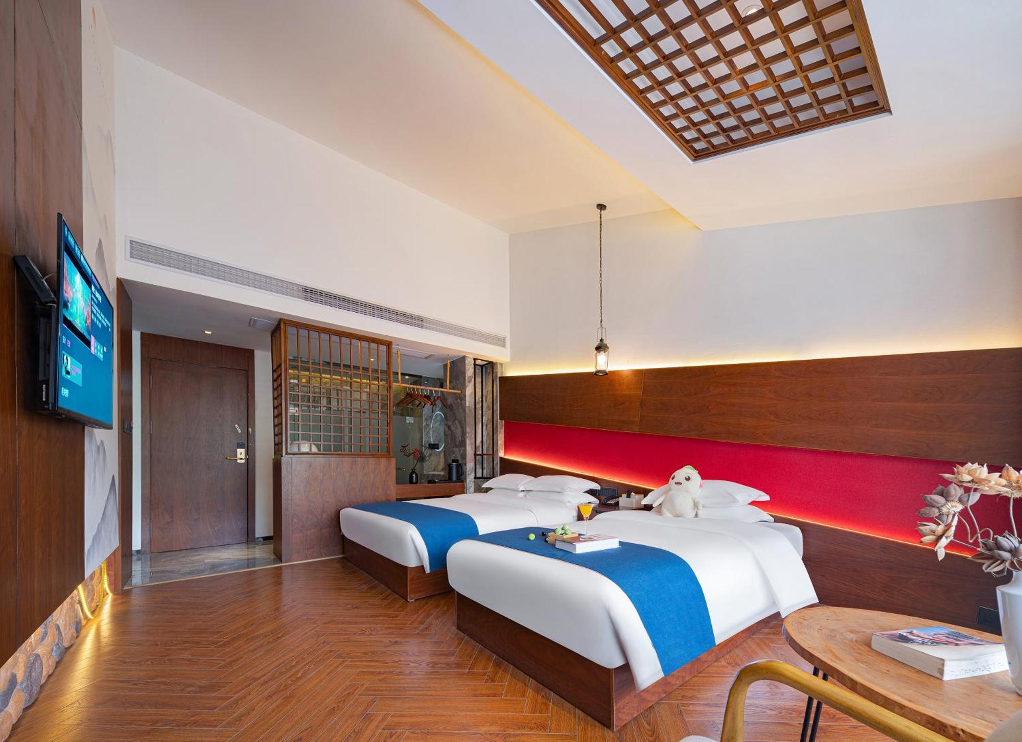 Hotel 張家界武陵源北岸輕奢客棧 森林公園店 Zhangjiajie Esterno foto