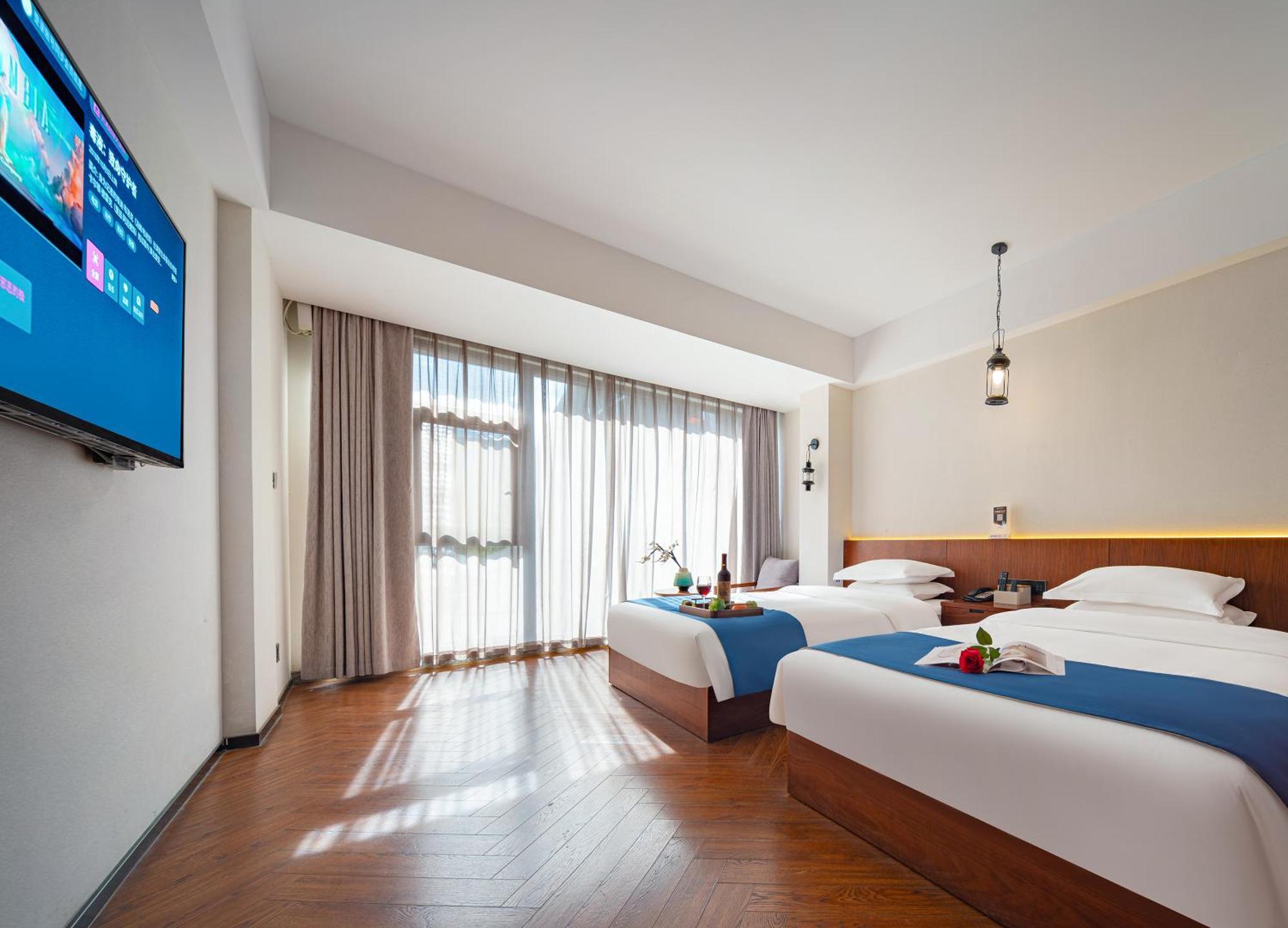 Hotel 張家界武陵源北岸輕奢客棧 森林公園店 Zhangjiajie Esterno foto