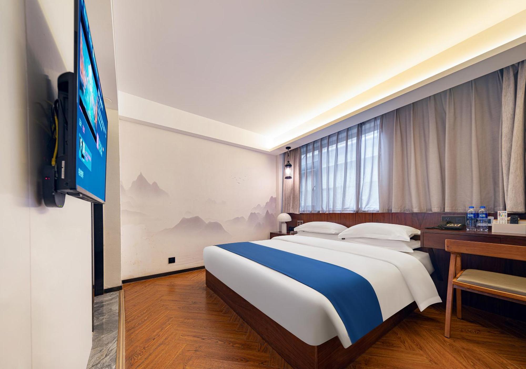 Hotel 張家界武陵源北岸輕奢客棧 森林公園店 Zhangjiajie Esterno foto