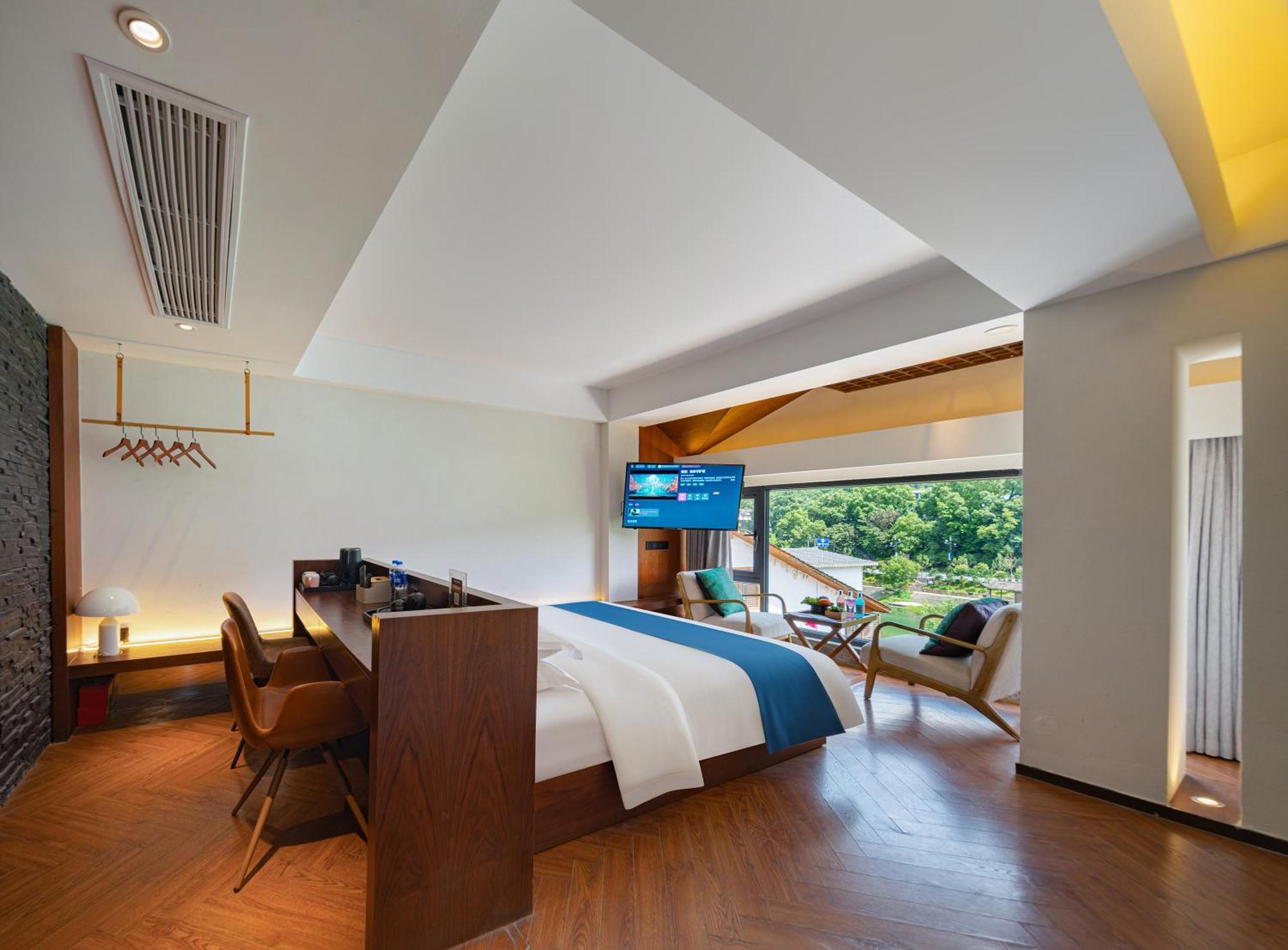 Hotel 張家界武陵源北岸輕奢客棧 森林公園店 Zhangjiajie Esterno foto