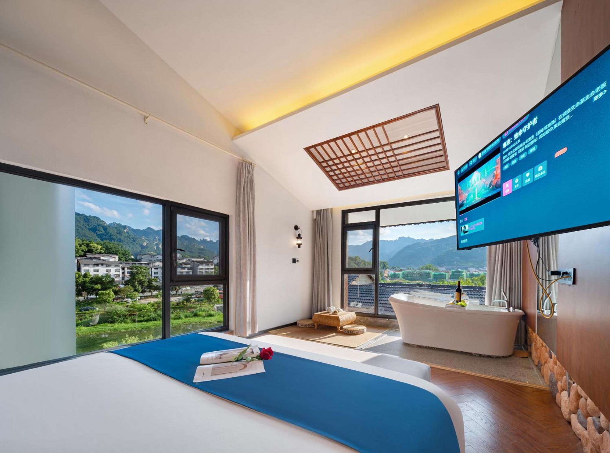 Hotel 張家界武陵源北岸輕奢客棧 森林公園店 Zhangjiajie Esterno foto