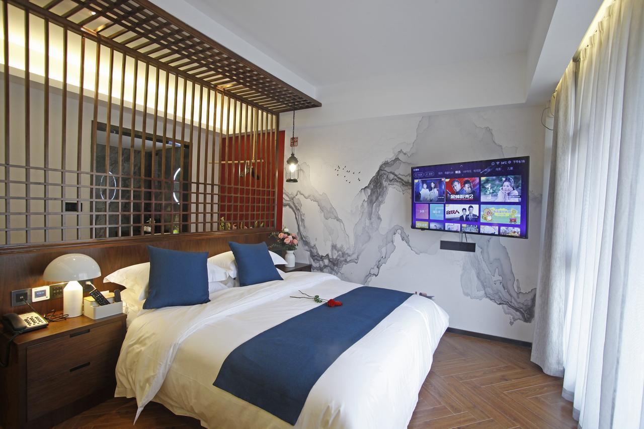 Hotel 張家界武陵源北岸輕奢客棧 森林公園店 Zhangjiajie Esterno foto