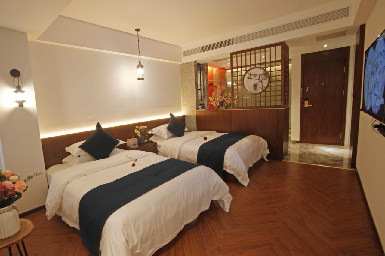 Hotel 張家界武陵源北岸輕奢客棧 森林公園店 Zhangjiajie Esterno foto