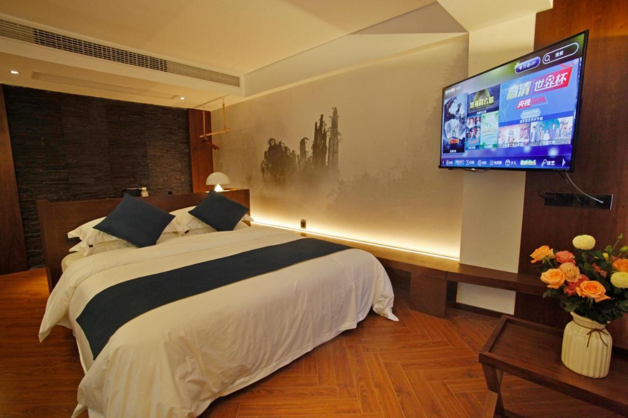 Hotel 張家界武陵源北岸輕奢客棧 森林公園店 Zhangjiajie Esterno foto