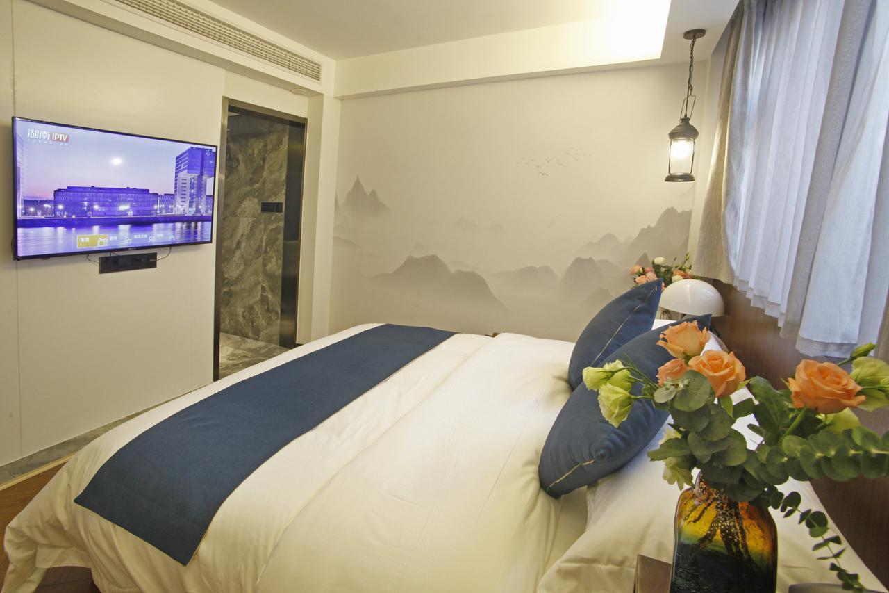 Hotel 張家界武陵源北岸輕奢客棧 森林公園店 Zhangjiajie Esterno foto