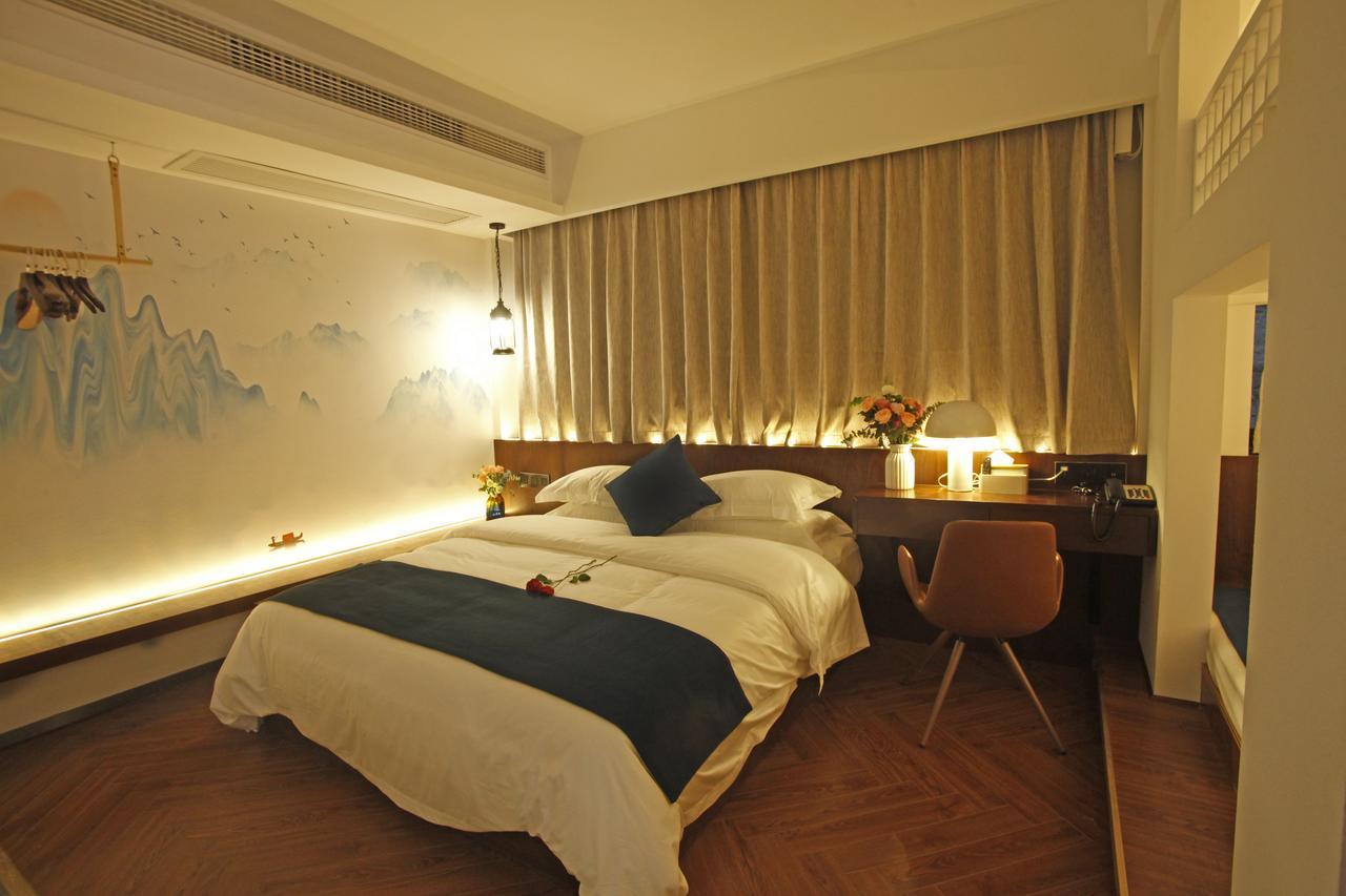 Hotel 張家界武陵源北岸輕奢客棧 森林公園店 Zhangjiajie Esterno foto