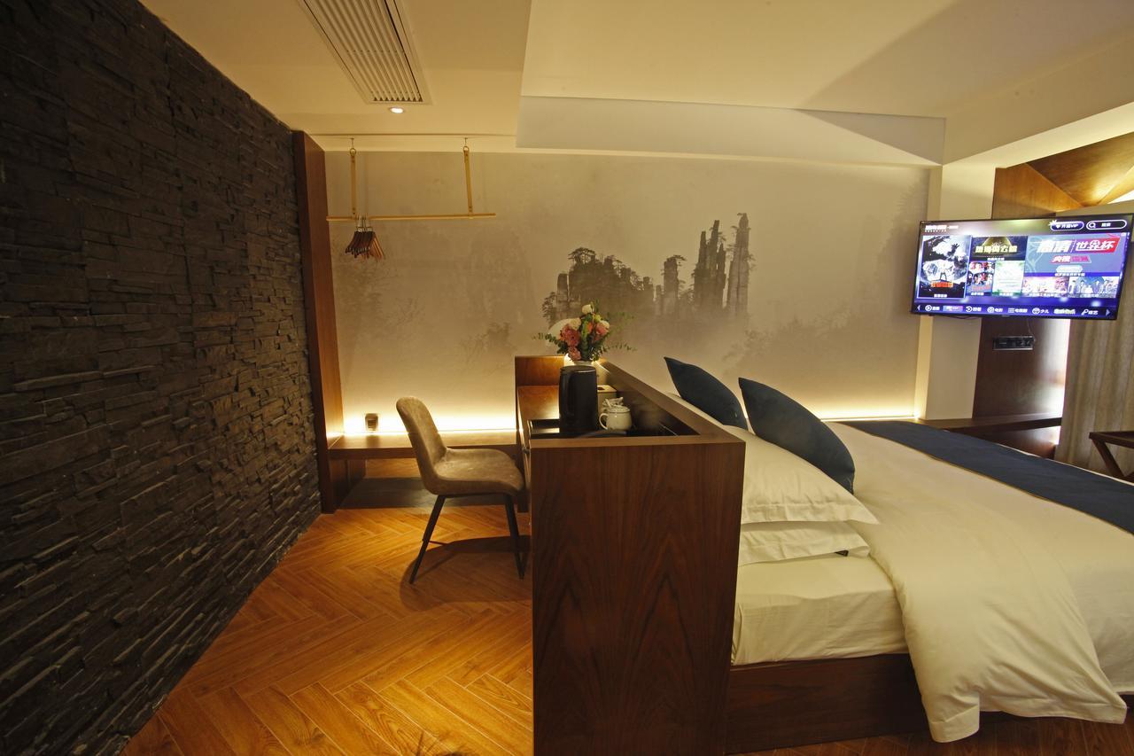 Hotel 張家界武陵源北岸輕奢客棧 森林公園店 Zhangjiajie Esterno foto