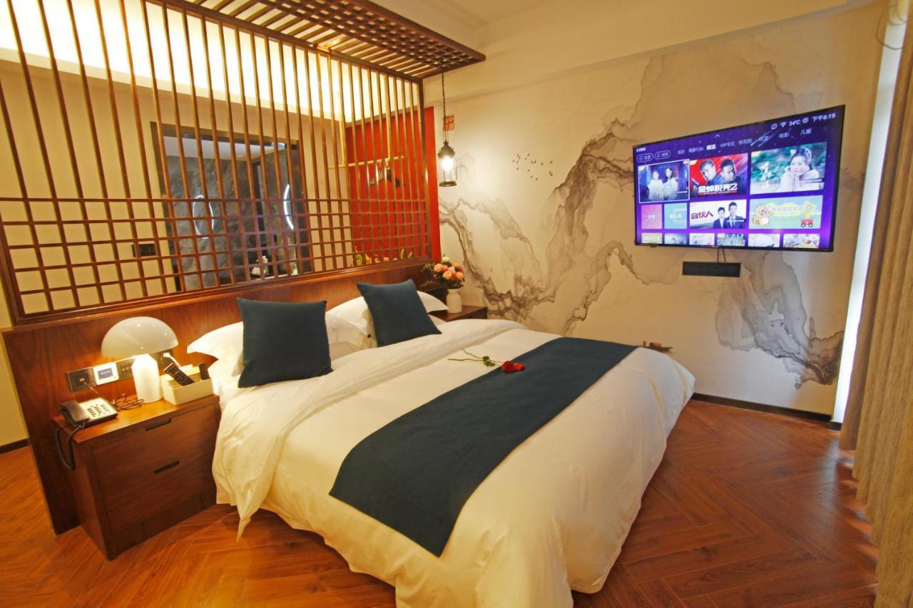 Hotel 張家界武陵源北岸輕奢客棧 森林公園店 Zhangjiajie Esterno foto